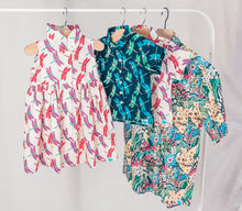 Load image into Gallery viewer, This dress can be paired with the children's dragonfly print in both cream and navy and the women's "Garden Party" shirt.