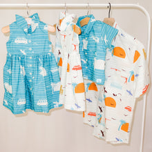 Load image into Gallery viewer, Our playful, button-up dress has just the right amount of poof and twirl.  The sleeveless style lets your child play with ease and we even added pockets so your littles can stow away their treasures.