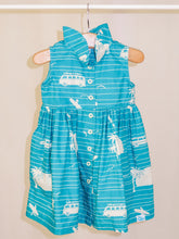 Load image into Gallery viewer, Our playful, button-up dress has just the right amount of poof and twirl.  The sleeveless style lets your child play with ease and we even added pockets so your littles can stow away their treasures.